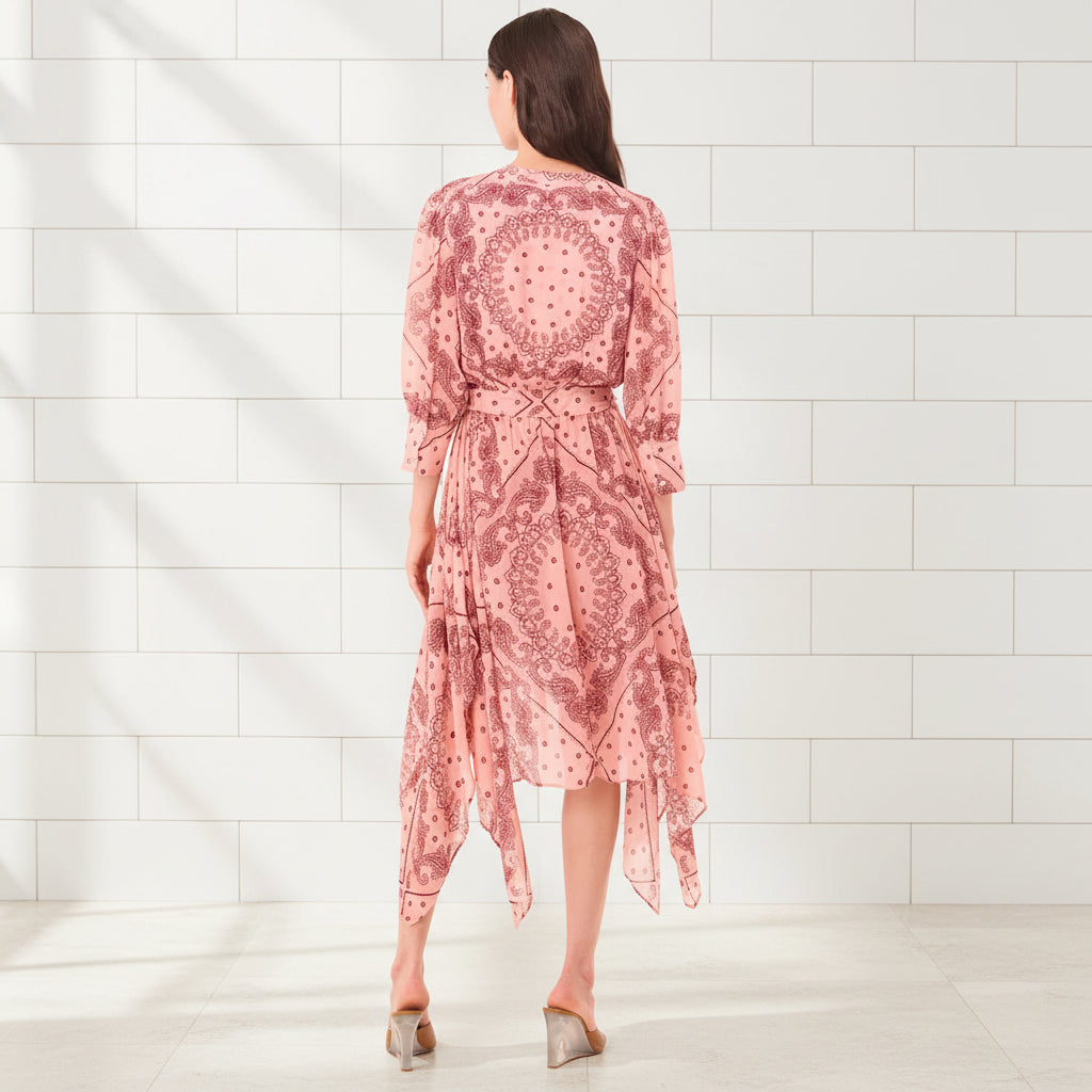 Angled view of women's bandana print handkerchief midi dress