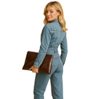 Women's long sleeve denim jumpsuit with straight leg cut side profile
