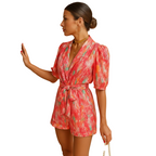 Women's printed short jumpsuit with belted waist for summer wear back view