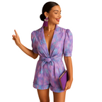 Women's printed short jumpsuit with belted waist for summer wear angled view